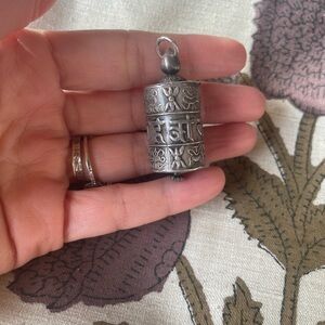 Sterling silver prayer wheel pendant